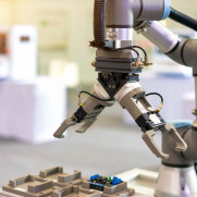 Robotic arm working on manufacturing floor